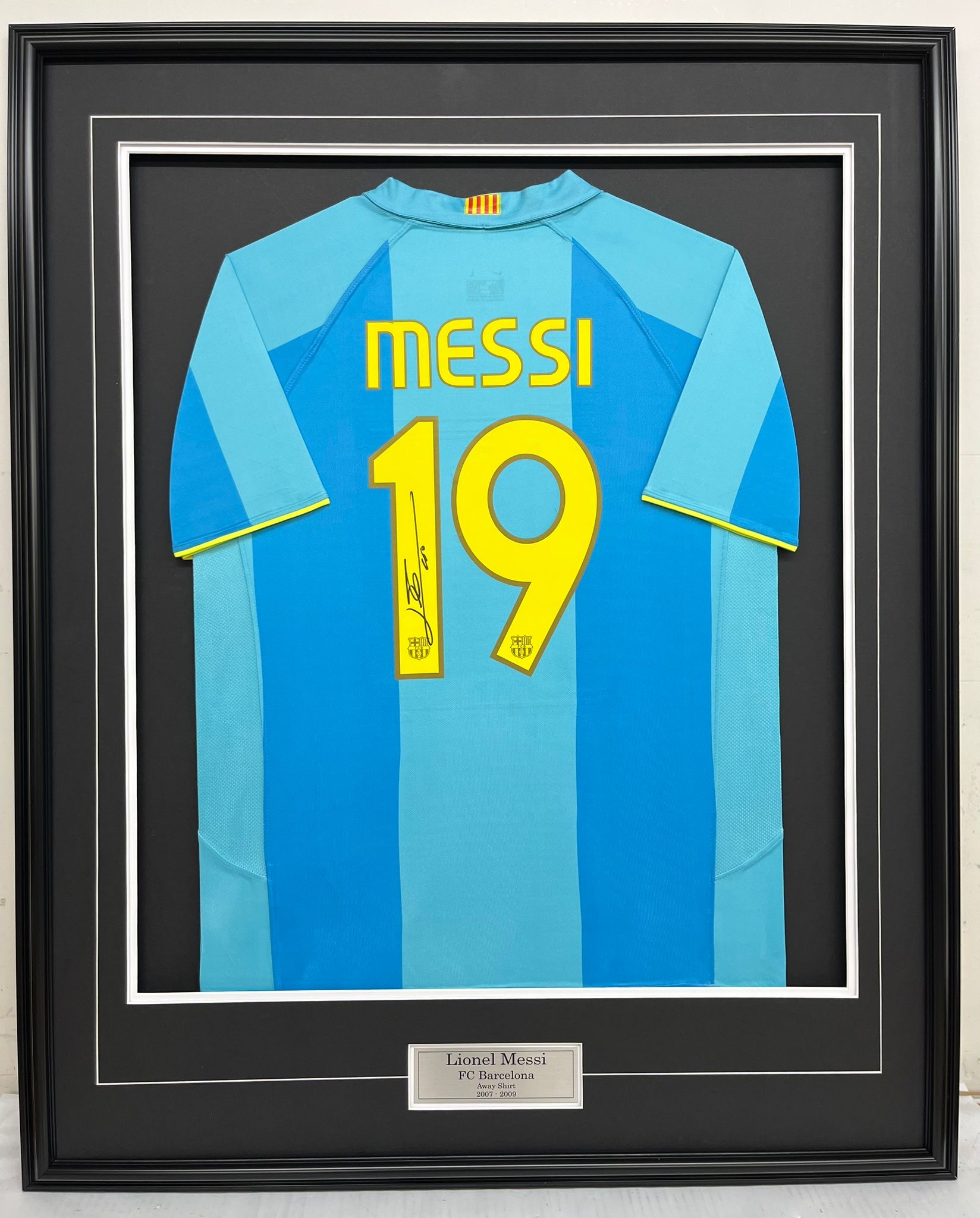 Lionel Messi – FC Barcelona – 2007-2009 Away Sky Blue (Turquoise) Shirt – Framed Autographed Jersey